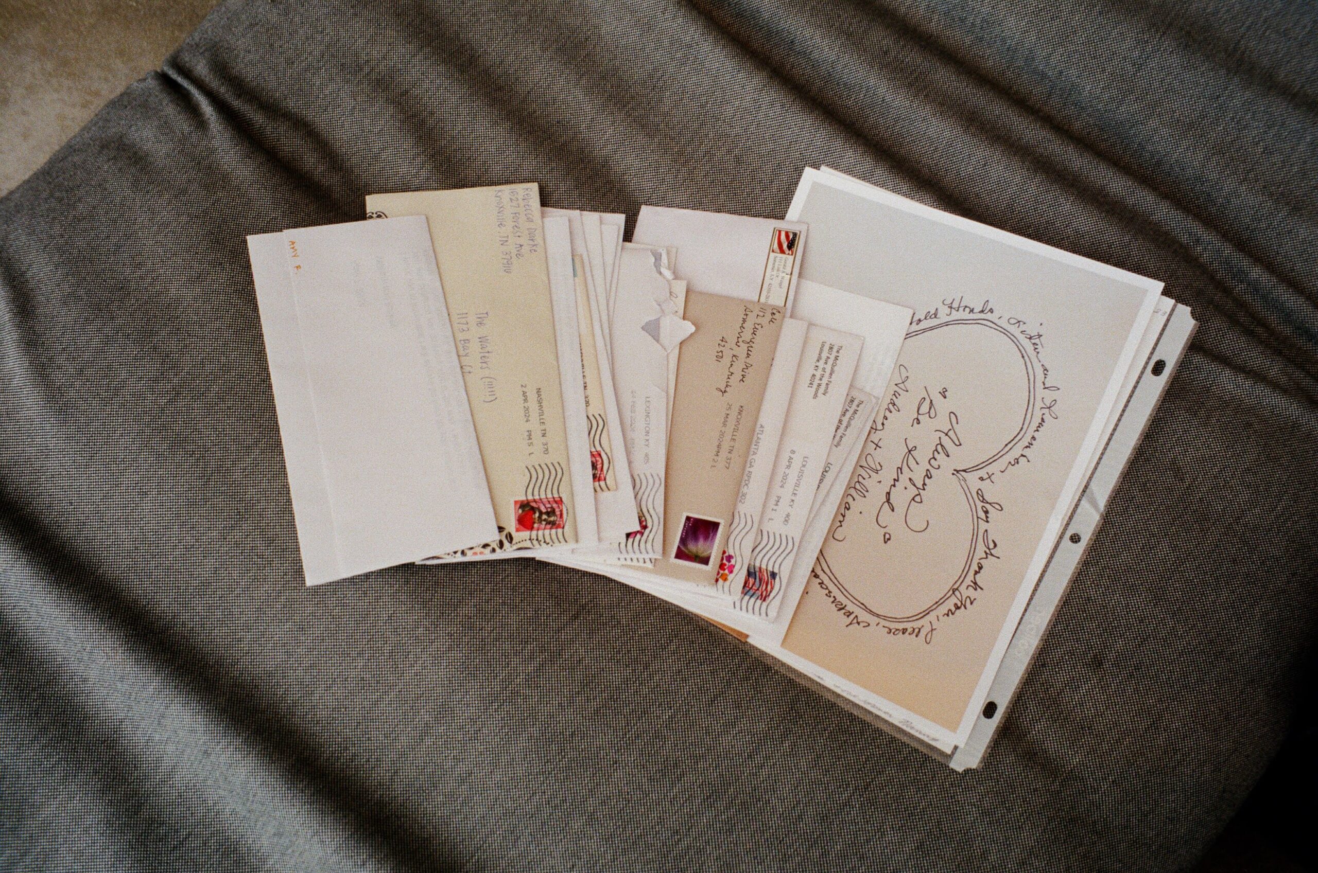 Letters sitting on a chair that have been opened by the couple eloping as a way to include family elopement in Greece