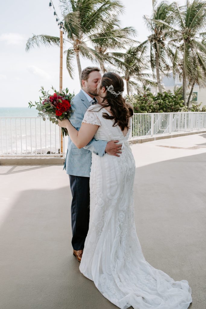 Couple sharing a kiss during their first look during their Florida Keys Elopement