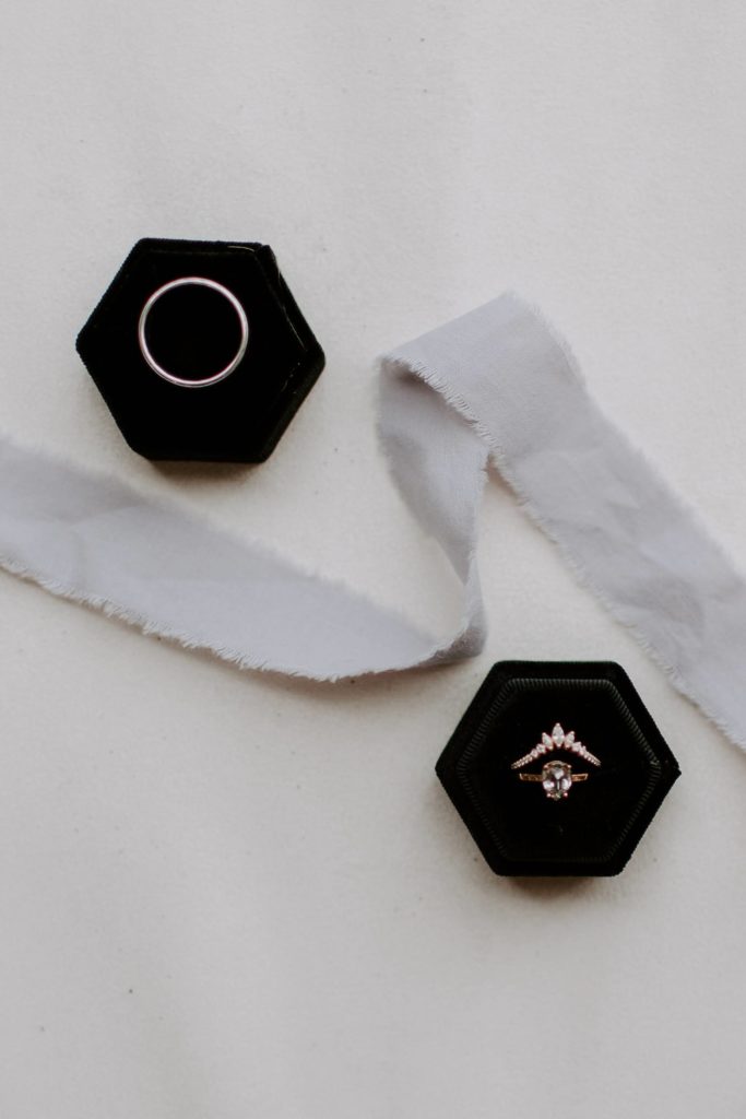 Elopement day details with rings and ribbons