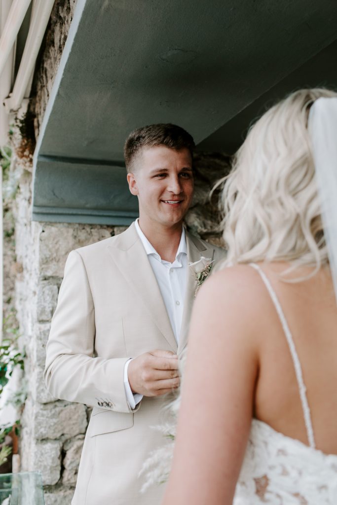 Man reading his vows and smiling during their Amalfi Coast wedding