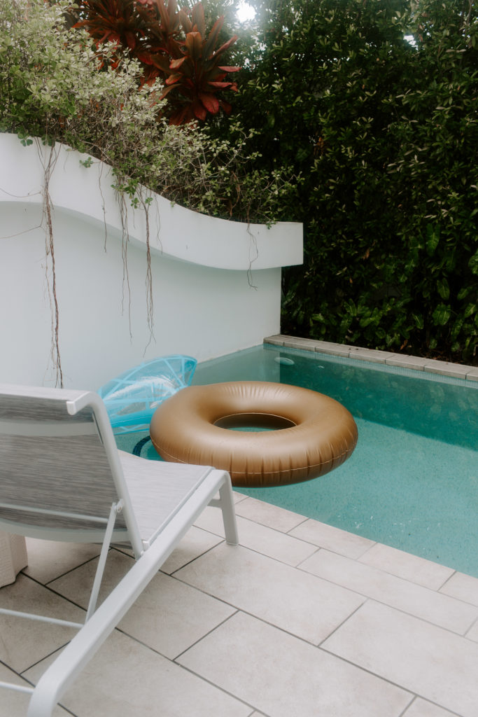 A ring floaty floating in the private pool during the couples all day key west elopement