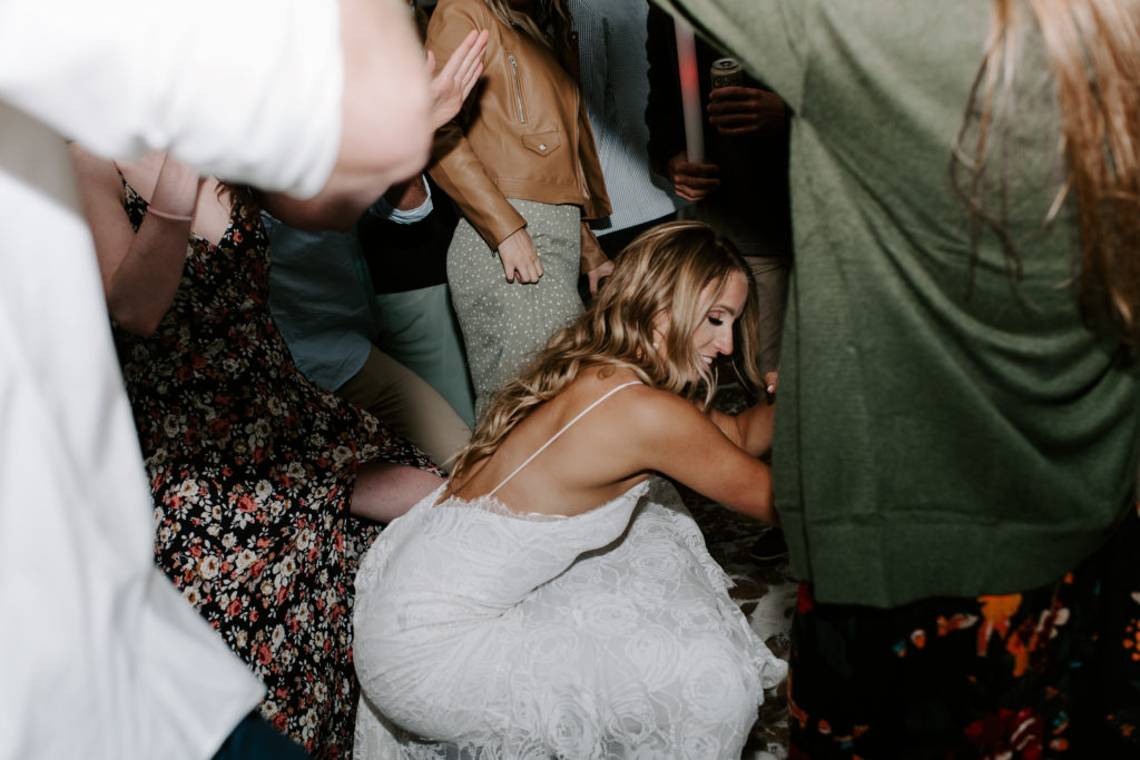 Bride dropping it low amongst guests on the dance floor