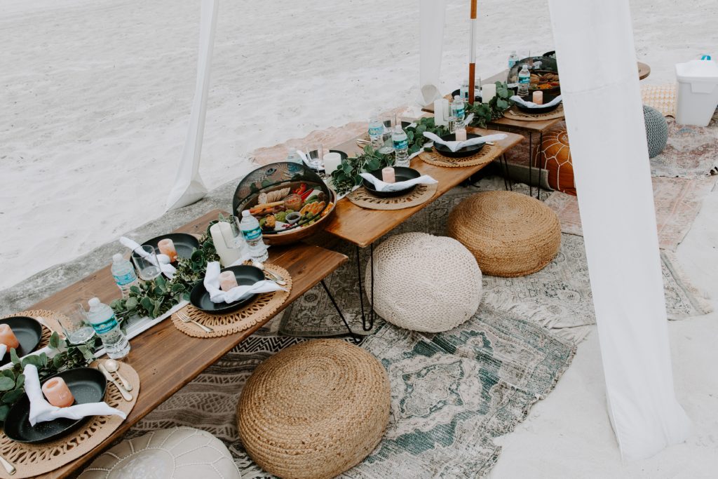 Beach reception picnic set up for a beach wedding in Clearwater, Florida