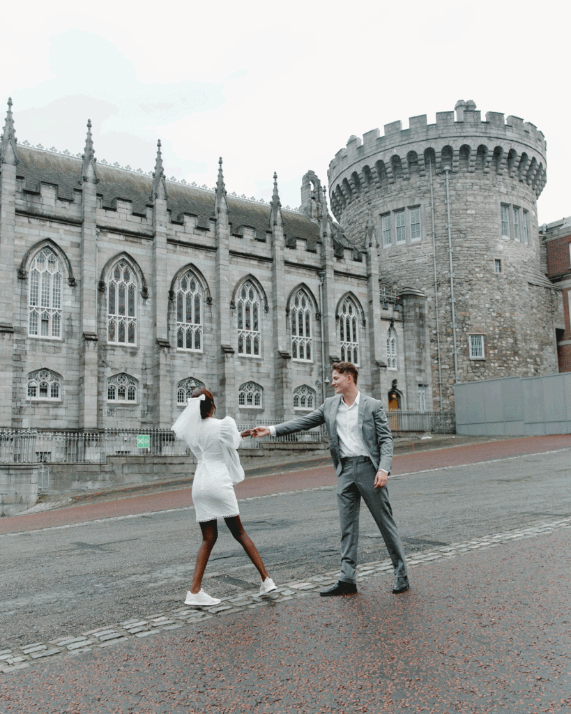 Couple spinning in circles during their downtown Dublin elopement