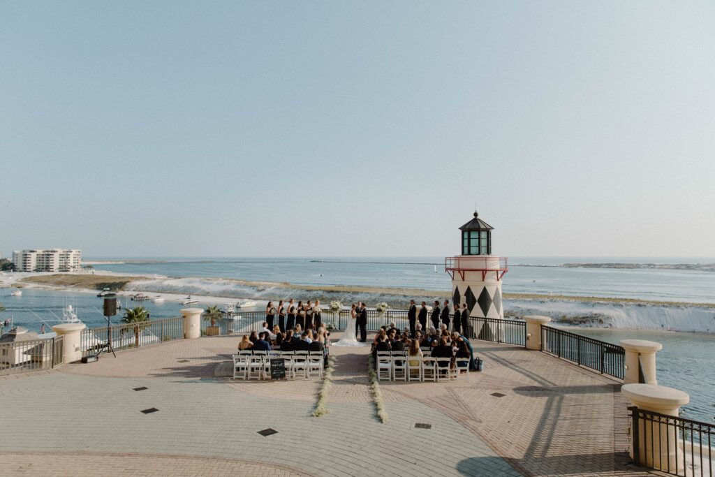 A wedding ceremony on the balcony of a hotel looking over the Gulf of Mexico in Destin, Florida