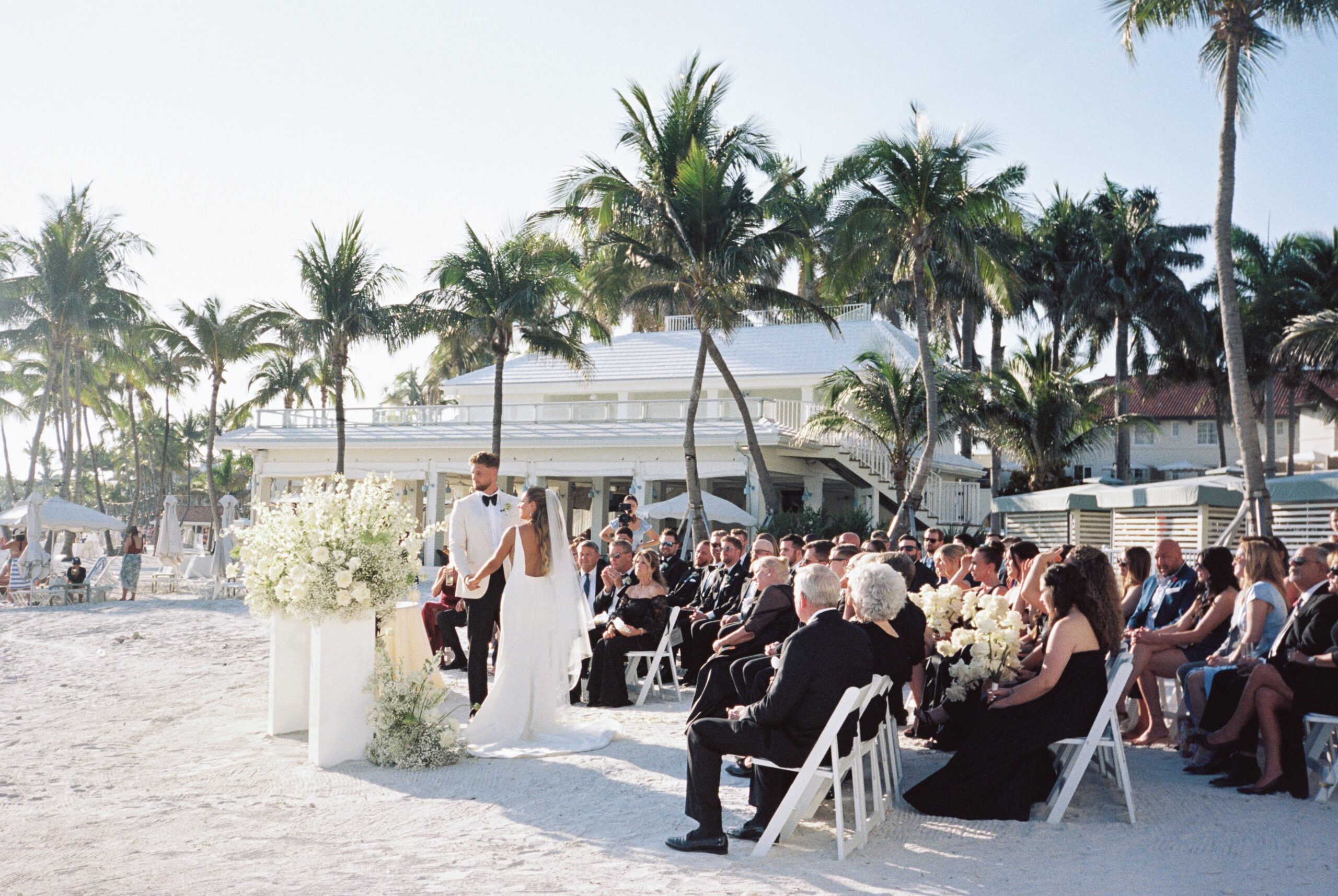 A beach wedding ceremony at Casa Marina Key West captured on 35mm film