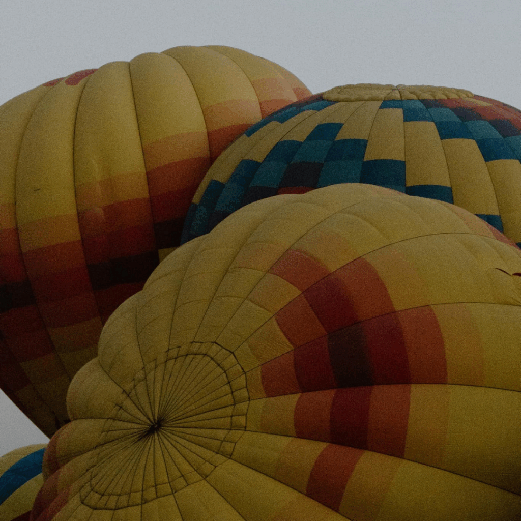 A hot air balloon blowing up during an Albuquerque, New Mexico adventure elopement