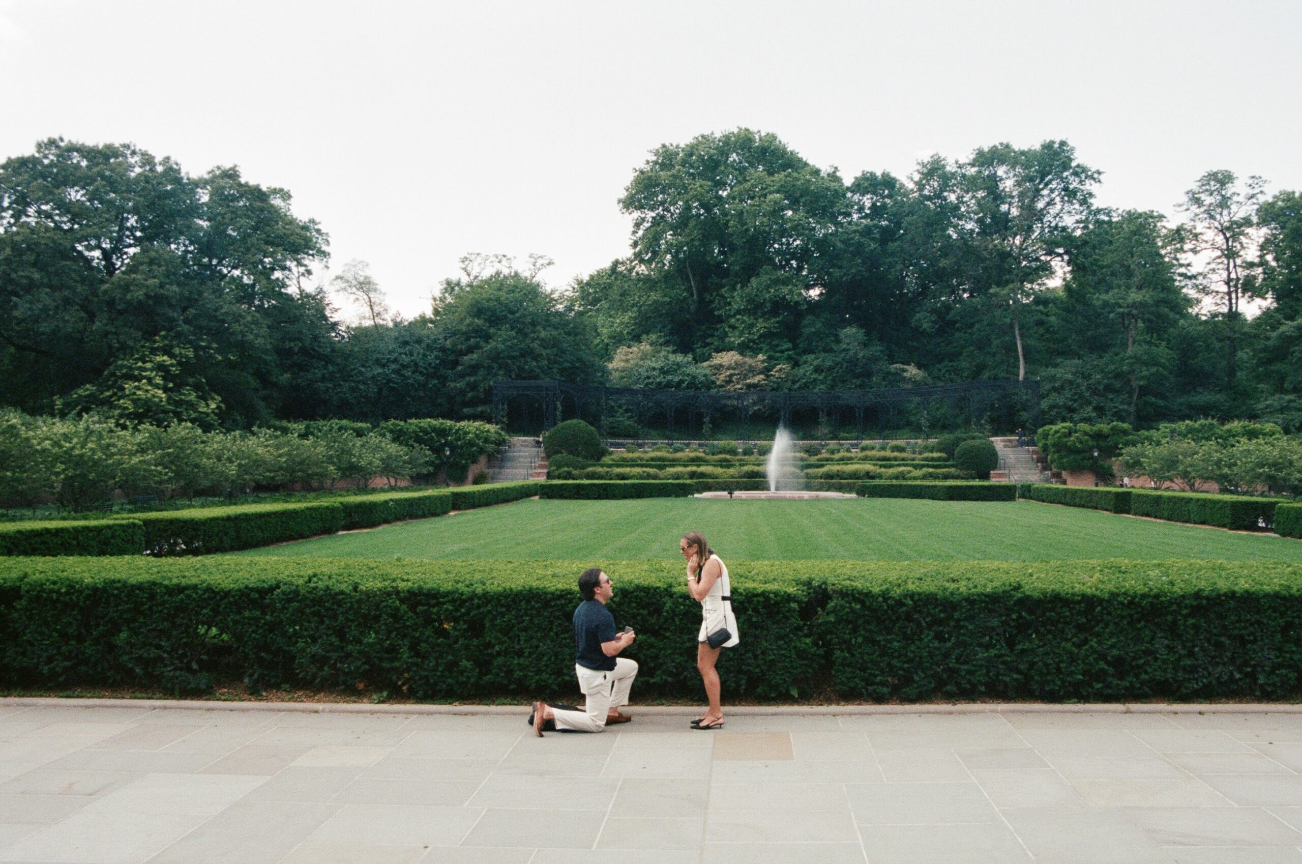 Summer engagement proposal by the lake in Central Park, New York, on 35mm film.