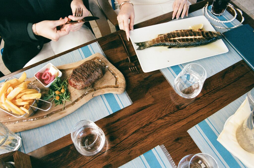 Rustic Hvar wedding meal with wine and traditional Croatian dishes for intimate elopement.