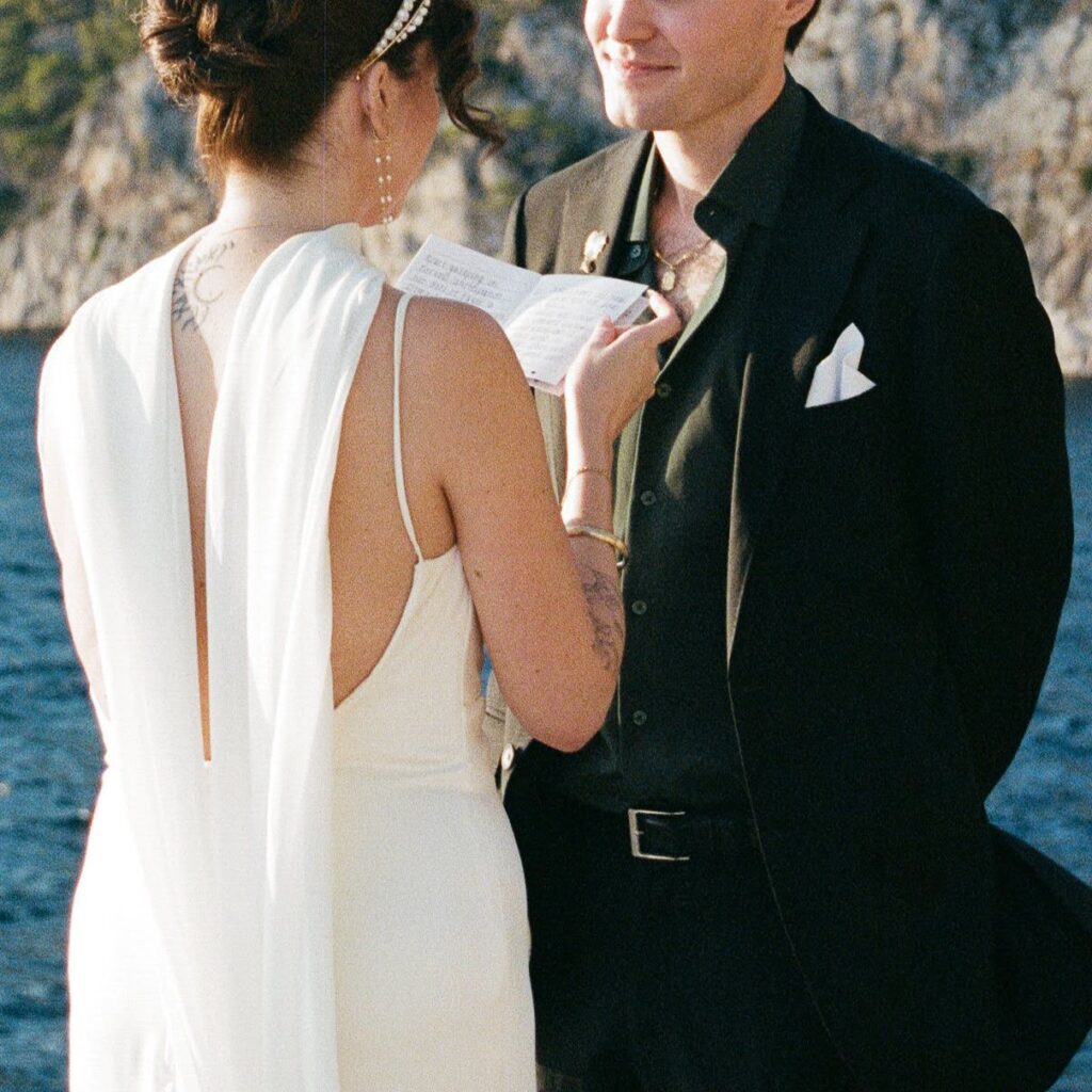 Bride and groom sharing a private moment during their vows in Hvar, Croatia.