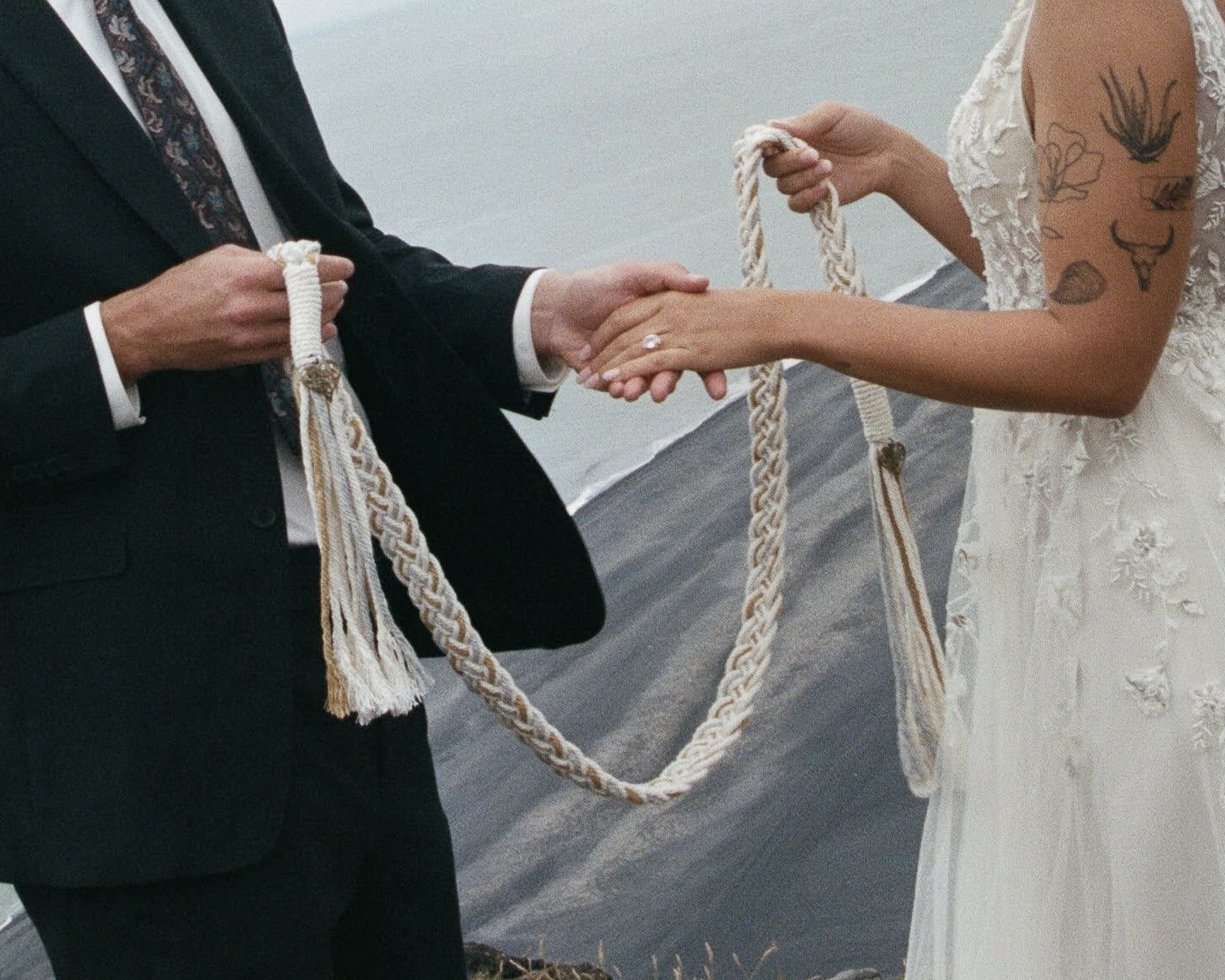 A couple participating in a hand fasting ceremony in Iceland